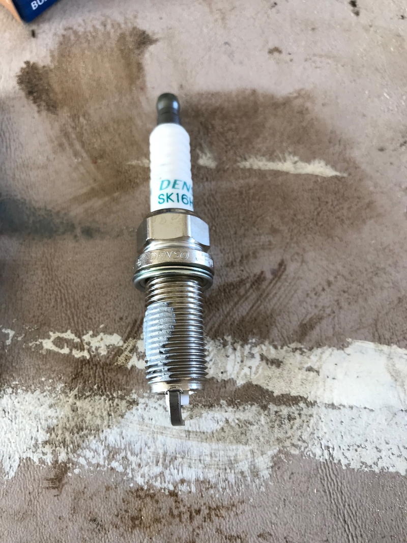 applying some anti-seize to the new plugs
